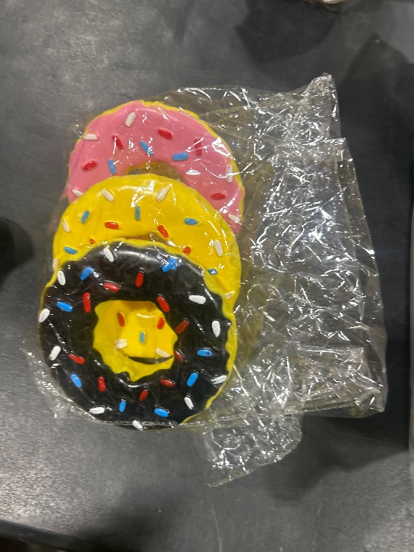 Photo 1 of Leitee 3 Pieces 5.3 Inch Assorted Donut Dog Chew Toy with Squeakers Rubber Dog Toy Pink Yellow Black for Interactive Play Small to Medium Dogs Puppy Aggressive Chewers