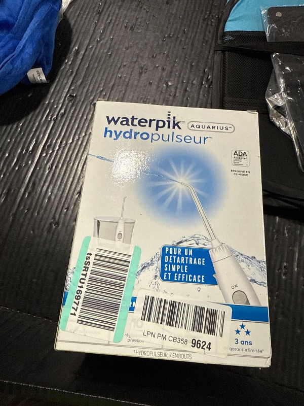 Photo 1 of Waterpik Aquarius Water Flosser For Teeth Cleaning, Gums, Braces, Dental Care, Electric Power With 10 Settings, 7 Tips For Multiple Users And Needs, ADA Accepted, White WP-660, Packaging May Vary