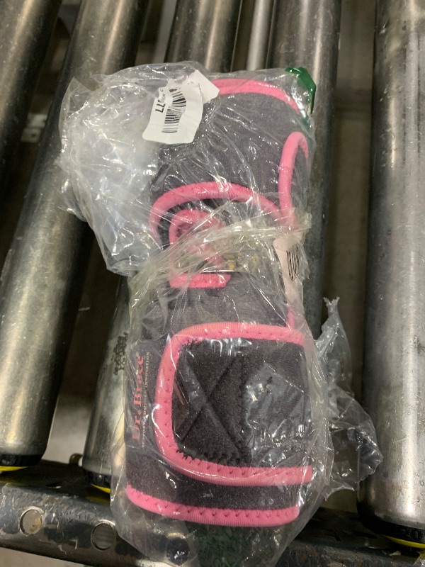 Photo 1 of pink wrist brace/support