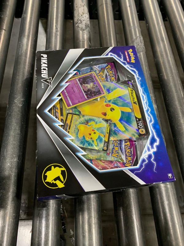 Photo 1 of Pokemon TCG Pikachu V Booster Box - 4 Booster Packs + Promo!