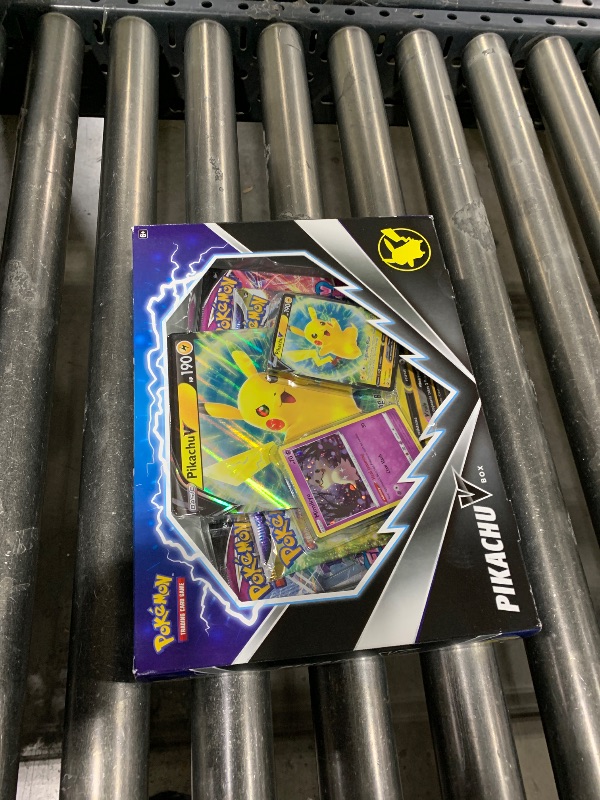 Photo 1 of Pokemon TCG Pikachu V Booster Box - 4 Booster Packs + Promo!