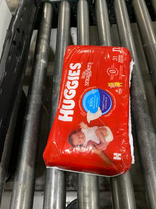 Photo 1 of Huggies Size Newborn Diapers, Little Snugglers Baby Diapers, Size Newborn (up to 10 lbs), 31 Count, Packaging May Vary
