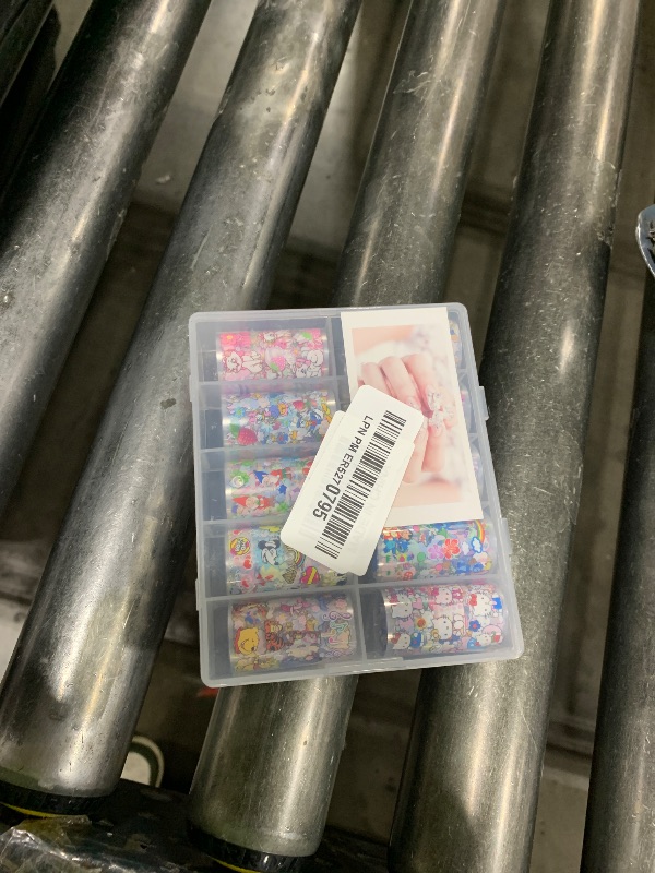 Photo 1 of 10 Rolls Cute Cartoon Nail Foil Transfer Stickers Nail Art Supplies Designer Nail Stickers Holographic Nail Art Foil Decals Cartoon Nails Designs for Women Acrylic Nails Decoration
