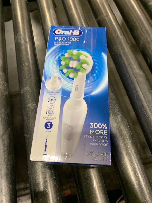 Photo 1 of Oral-B Pro 1000 Rechargeable Electric Toothbrush, White