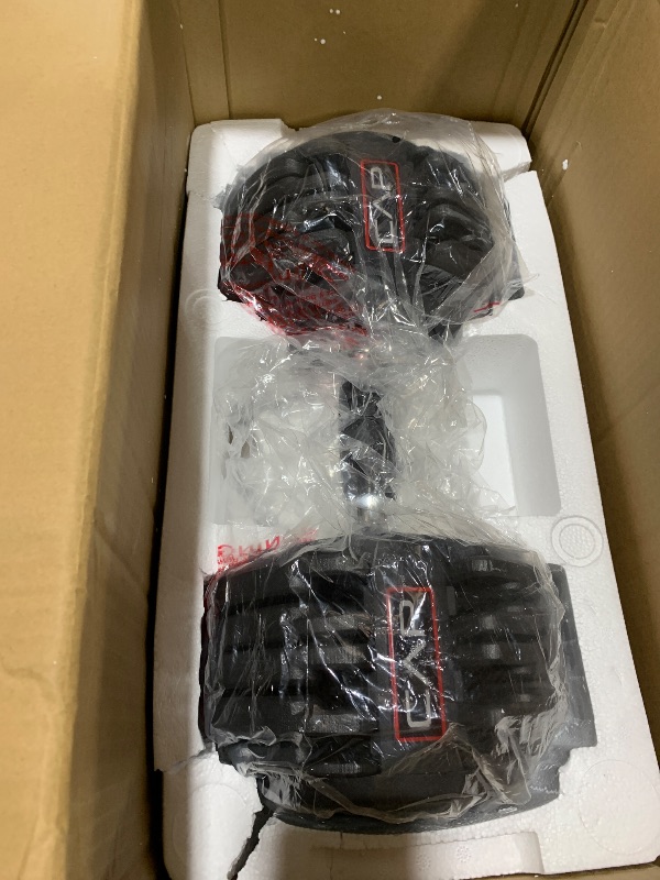Photo 1 of CAP Barbell ADJUSTABELL® 55 lb Adjustable Dumbbells with Contoured Full Rotation Handle, Honeycomb Chrome and Black Handle