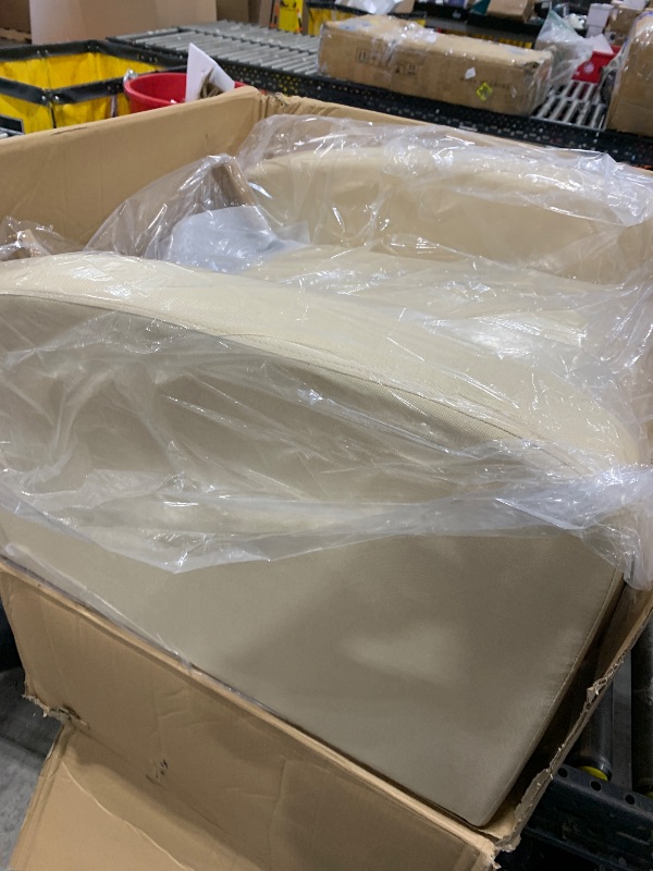 Photo 1 of beige sofa chair