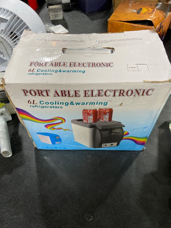 Photo 1 of Car Refrigerator, 12V Mini Fridge Electric Cooler and Warmer for Car, 6 Liter Capacity, Portable Car Freezer Car Fridge Small Fridge for Car, RV, and Camping Use