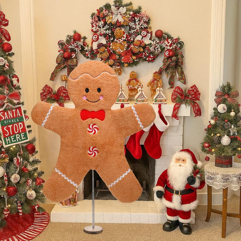 Photo 1 of Wesiti 30 Inch Large Christmas Plush Gingerbread Man Figures with Bow Tie Xmas Candy Soft Gingerbread Doll Ornament with Wooden Stand for Home Table Fireplace Christmas Holiday