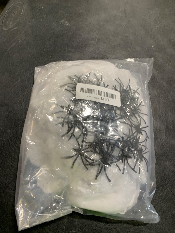 Photo 1 of 1000 sqft Spider Webs Halloween Decorations Bonus with 30 Fake Spiders, Super Stretch Cobwebs for Halloween Indoor and Outdoor Party Supplies