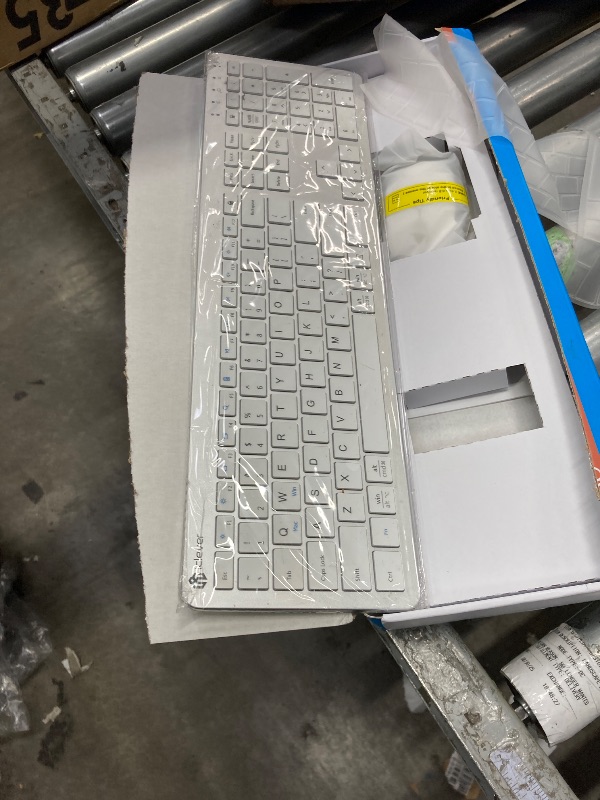 Photo 1 of **t is used, it is not known if it is missing parts, therefore it is not known if it works at 100%.***Wireless Keyboard and Mouse Combo - Full Size Slim Thin Wireless Keyboard Mouse with Numeric Keypad 2.4G Stable Connection Adjustable DPI (White & Silver