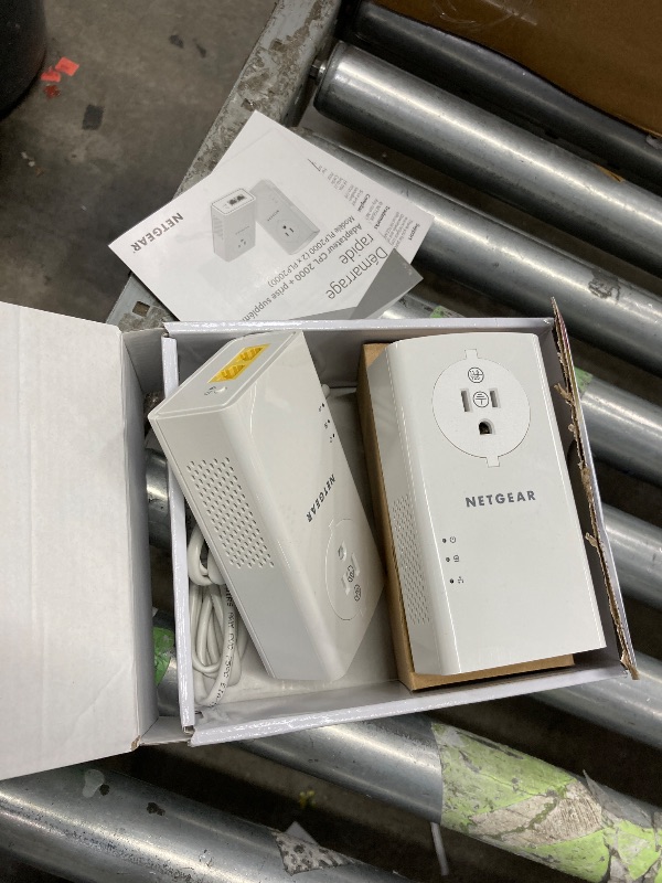 Photo 1 of **It is used, it is missing a part and it is not known if it works 100% because it did not come with the connector****NETGEAR Powerline Adapter Kit, 2000 Mbps Wall-Plug, 2 Gigabit Ethernet Ports with Passthrough + Extra Outlet (PLP2000-100PAS)