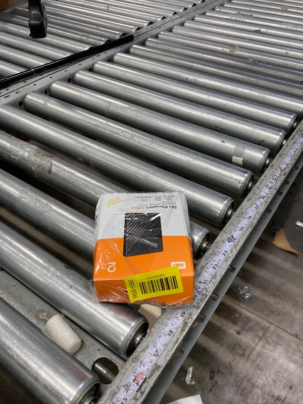 Photo 1 of **It is used, it is missing a part and it is not known if it works 100% because it did not come with the connector***WD 2TB My Passport Ultra, Silver, Portable External Hard Drive, backup software with defense against ransomware, and password protection,