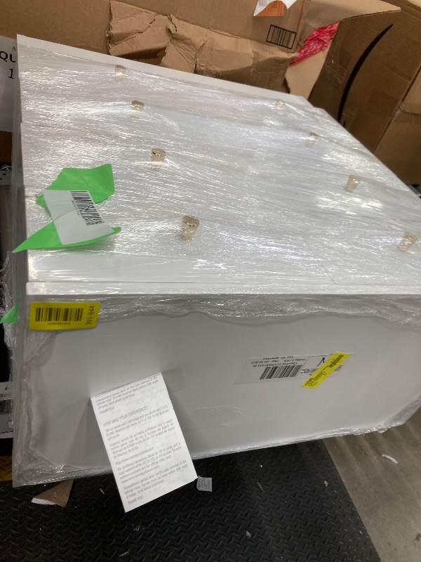 Photo 1 of *Damage to the bottom/Chipped* White Dresser, Gold Knobs