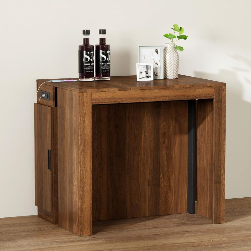 Photo 1 of Extendable Dining Table with Storage, Transformer Extra Console Table for 1-12 People, Folding Space Saving Dining Room Table with Built-in Outlet for Homes, Apartments, Walnut
