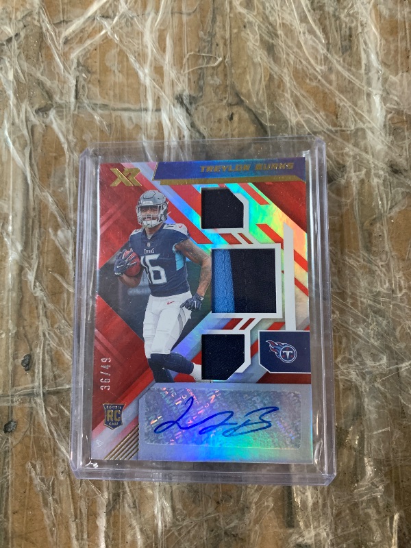 Photo 1 of Treylon Burks [Triple Swatch Autograph] #212 2022 Panini XR