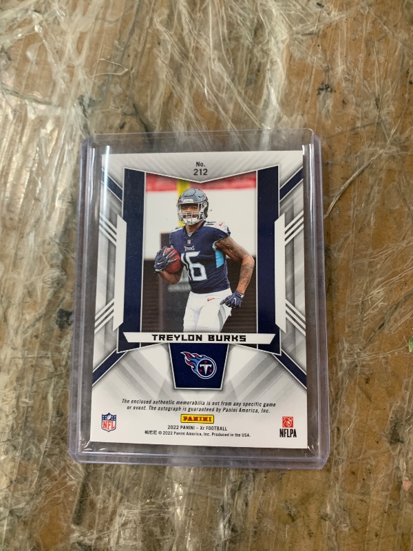 Photo 1 of Treylon Burks [Triple Swatch Autograph] #212 2022 Panini XR