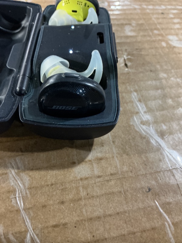 Photo 1 of **RUBBER IS FALLING APART**Bose sound port, free, truly wireless sport, headphones, midnight blue, and citron