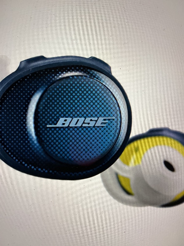 Photo 1 of **RUBBER IS FALLING APART**Bose sound port, free, truly wireless sport, headphones, midnight blue, and citron