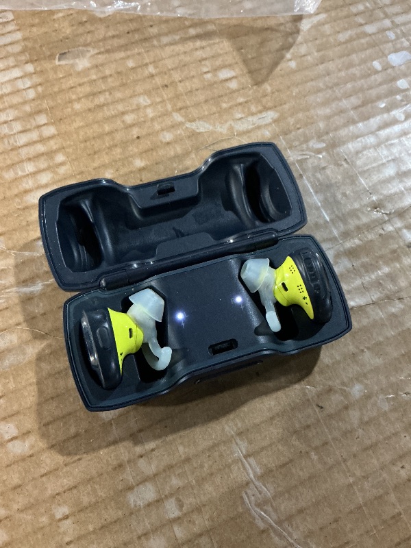 Photo 1 of **RUBBER IS FALLING APART**Bose sound port, free, truly wireless sport, headphones, midnight blue, and citron