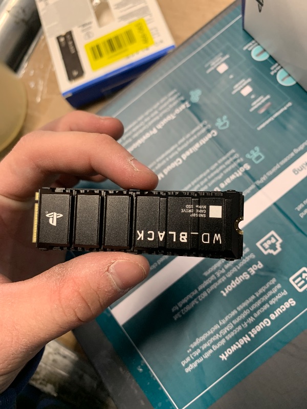 View 3 of ***PARTS ONLY*** ***NONFUNCTIONAL*** WD_BLACK 4TB SN850P NVMe M.2 SSD Officially Licensed Storage Expansion for PS5 Consoles, up to 7,300MB/s, with heatsink - WDBBYV0040BNC-WRSN,Black