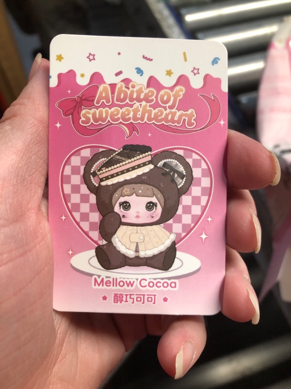 Photo 1 of ***FACTORY SEALED - OPENED FOR INSPECTION***Nommionline (Official License) Nommi-A Bite of Sweetheart Series Plush Blind Box, Kawaii Plush Toy Figures, Cute Stuffed Doll with Cake Hat and Pink Ribbon for Kids Room Decor and Gifts