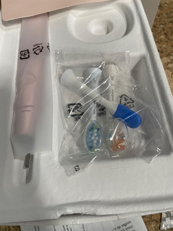 Photo 1 of **PRODUCT NOT CHARGING** Philips Sonicare DiamondClean Smart 9500 Electric Toothbrush, Sonic Toothbrush with App, Pressure Sensor, Brush Head Detection, 5 Brushing Modes and 3 Intensity Levels, Pink, Model HX9923/21