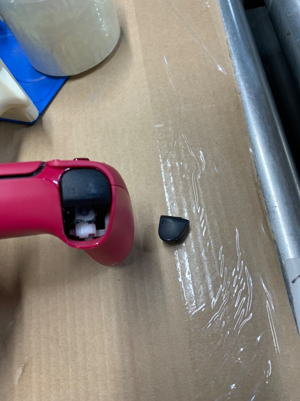 Photo 1 of ***major damage*** 
PlayStation DualSense™ Wireless Controller – Cosmic Red - for PS5, PC, MAC & Mobile