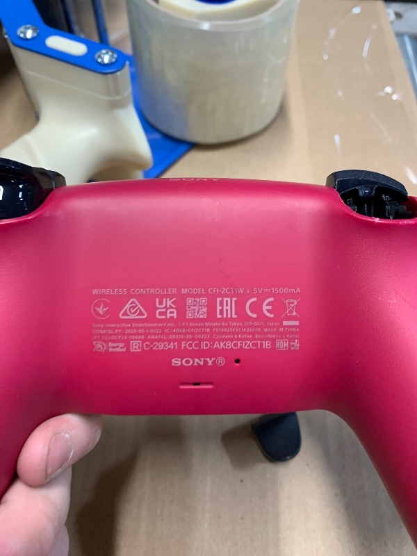 Photo 1 of ***major damage*** 
PlayStation DualSense™ Wireless Controller – Cosmic Red - for PS5, PC, MAC & Mobile