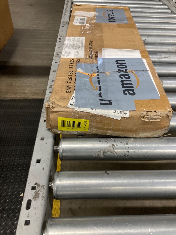 Photo 1 of ***Defective threads***Amazon Basics Cooling Breathable Elevated Dog Bed with Durable Metal Frame, Medium, 43 x 26 x 7.5 Inch, Grey, Easy to Assemble***Defective threads***