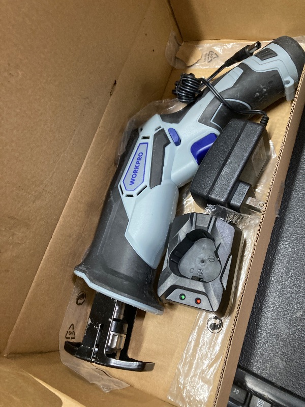 Photo 1 of *Used/Scratches* WORKPRO 12V Cordless Reciprocating Saw with Clamping Jaw, 2.0Ah Li-Ion Battery with 1 Hour Fast Charger, Variable Speed and Tool-Free Blade Change, 3 Saw Blades for Wood & Metal Cutting