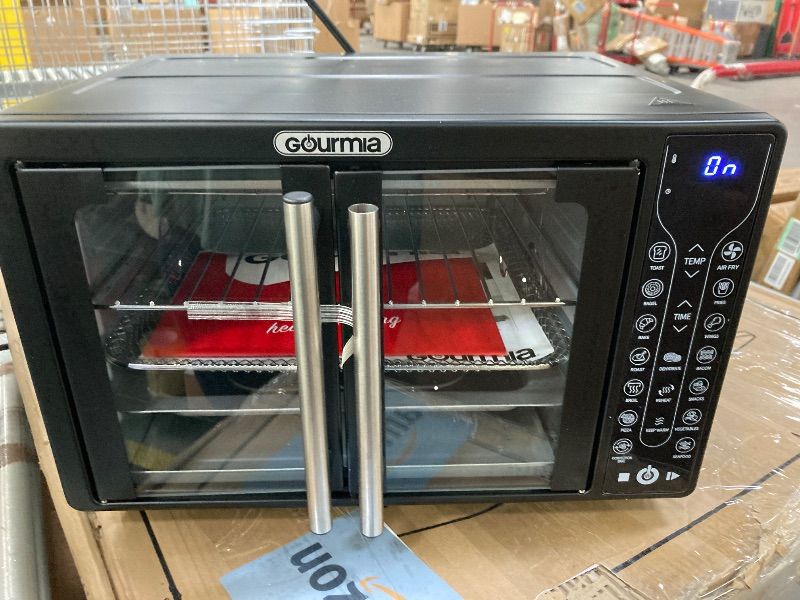 Photo 1 of **DOOR HANDLE DAMAGE**Gourmia French Door Air Fryer – 25 Qt Large Capacity Convection Oven, Fryforce 360°, Digital Display with 17 Cooking Presets, Bake, Toast, Roast, Dehydrate, Fits 12” Pizza