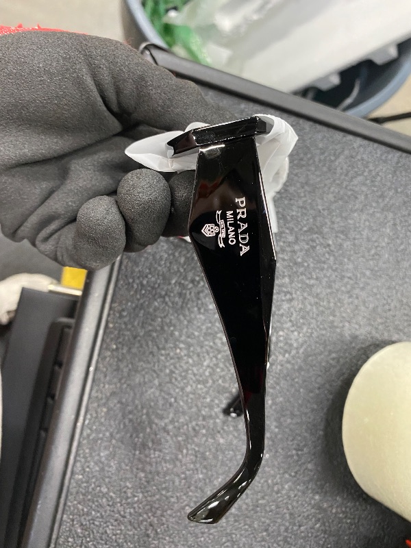 Photo 1 of **False
PRADA Sunglasses (Black)