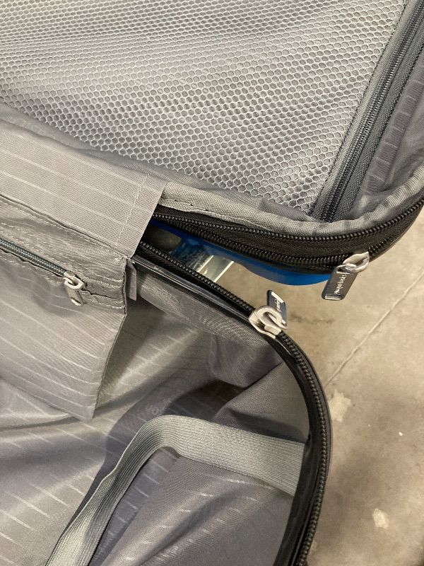 Photo 1 of ***DAMAGE -ZIPPER BROKEN -SELLING AS IS *** Amazon Basics 30" Hardside Large Checked Luggage, Expandable For Up to 15% More Space, With Scratch-Resistant Surface, Four Multi-directional Wheels, Telescoping Handle, Light Blue