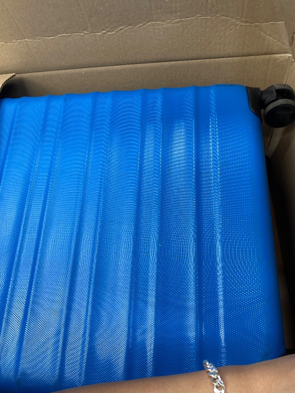 Photo 1 of ***DAMAGE -ZIPPER BROKEN -SELLING AS IS *** Amazon Basics 30" Hardside Large Checked Luggage, Expandable For Up to 15% More Space, With Scratch-Resistant Surface, Four Multi-directional Wheels, Telescoping Handle, Light Blue