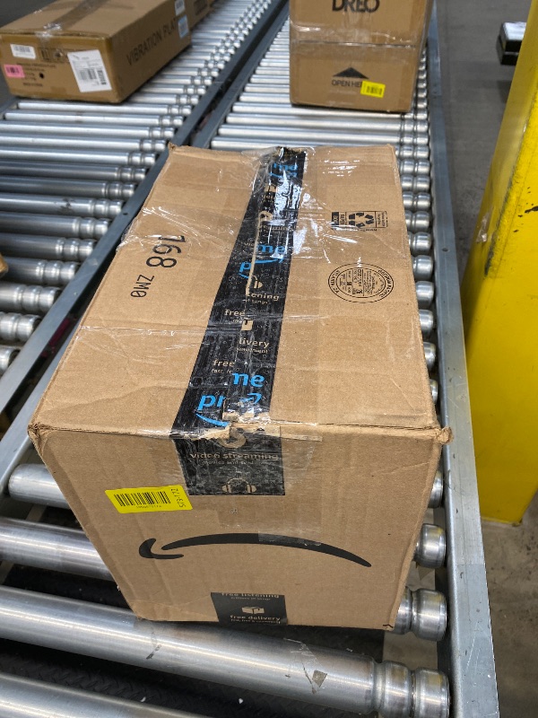 Photo 1 of **NOT FUNCTIONING**Lasko Portable Indoor Electric Ceramic Space Heater with Tip-Over Safety Switch, Overheat Protection and Thermostat, 2 Speeds, Safe for Home, 9.2 Inches, Dark Gray, 1500W, 754201