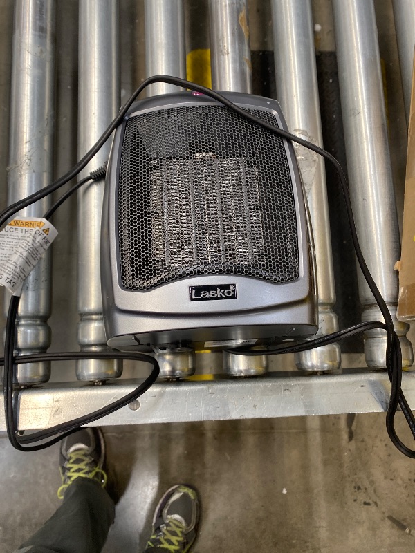 Photo 1 of **NOT FUNCTIONING**Lasko Portable Indoor Electric Ceramic Space Heater with Tip-Over Safety Switch, Overheat Protection and Thermostat, 2 Speeds, Safe for Home, 9.2 Inches, Dark Gray, 1500W, 754201