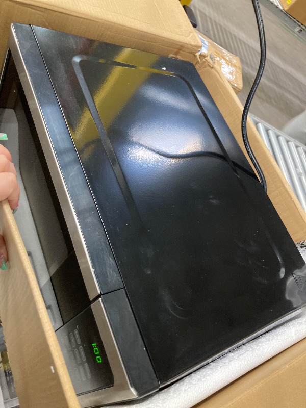 Photo 1 of **PARTS ONLY***Emerson 1.2 Cu. Ft. Microwave Oven with Inverter, Timer & LED Display, 1000W, 10 Power Levels, 8 Pre-Programmed Settings, Removable Glass Turntable with Child Safe Lock, MWI1212SS, Stainless Steel