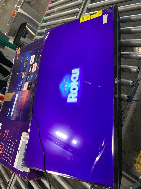 Photo 1 of *** MINOR SCRATCHES **** Roku Smart TV – 40-Inch Select Series, 1080p Full HD TV – Roku TV with Voice Remote – Flat Screen LED Television with Wi-Fi for Streaming Live Local News, Sports, Family Entertainment