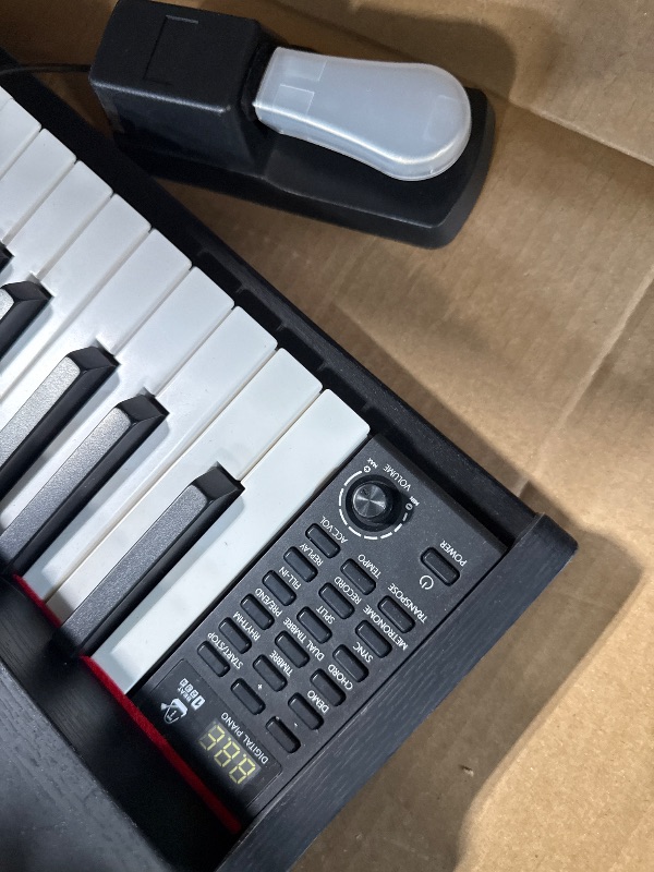Photo 1 of ***NOT FULLY WEIGHTED*** ZHRUNS Digital Piano 88 Key Weighted, Full Size Electric Keyboard Piano for Beginners, Portable Piano Keyboard with Sheet Music Stand, Sustain Pedal, Power Adapter, Black (Keyboard Only)