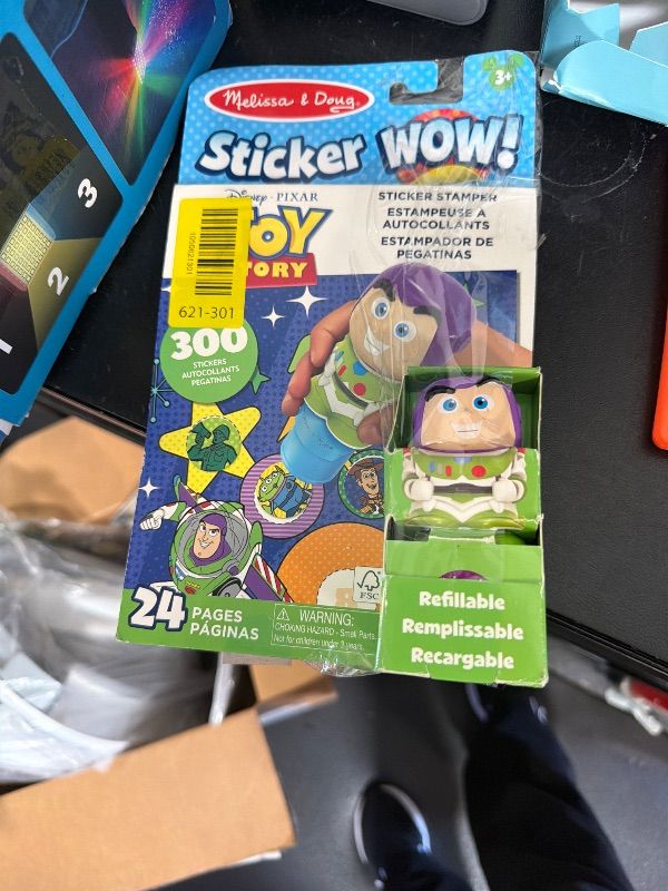Photo 1 of ** USED** Melissa & Doug Sticker Wow!™ 24-Page Activity Pad and Sticker Stamper, 300 Stickers, Arts and Crafts Fidget Toy Collectible Character – Disney Buzz Lightyear - for Kids Ages 3+ - FSC Certified