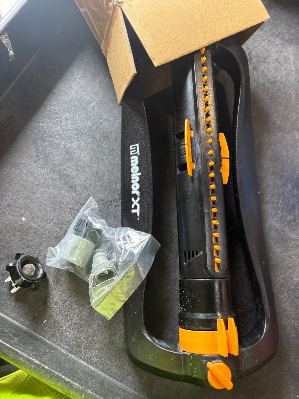 Photo 1 of **DIRTY**
Melnor 65167AMZ XT Turbo Oscillating Sprinkler, 4,500 sq. ft., Quick Connect Bundle, 3-Way Adjustable, Black, Yellow