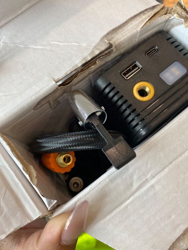 Photo 1 of **UNTESTED**
Tire Inflator Portable Air Compressor - 150 PSI 4X Fast Inflation Rechargeable Battery & 12V DC Adapter Powered Air Pump for Car Bike Motorcycle Tires Balls with LCD Display, LED Light
