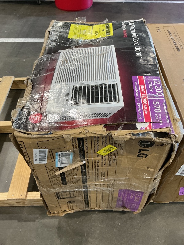 Photo 1 of *MAJOR DAMAGE*
LG 12,200 BTU Window Air Conditioner with Supplemental Heat, 230/208V, Cools 570 Sq.Ft. (19' x 30' Room Size), Electronic Controls with Remote, 2 Cooling, Heating & Fan Speeds, Slide In-Out Chassis