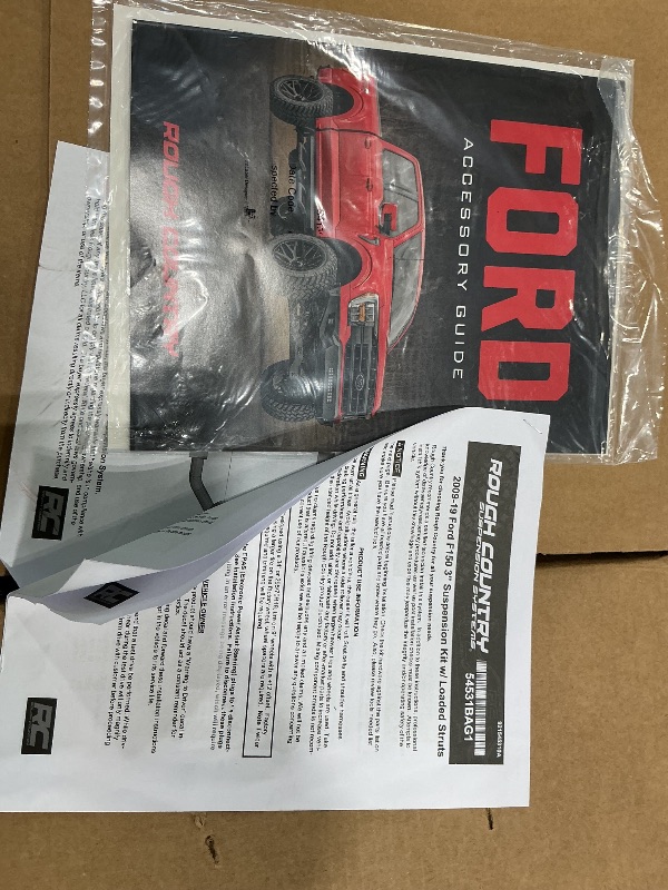 Photo 1 of *MISSING PARTS - see clerk notes*
Rough Country 3" Suspension Lift Kit w/M1 Struts for 09-13 F-150 4WD - 54440RED