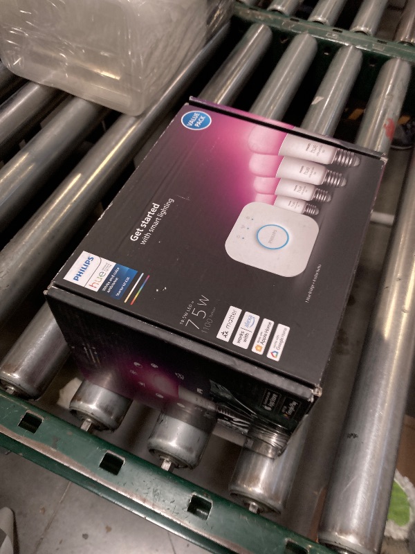 Photo 1 of Philips Hue Smart Light Starter Kit - Includes (1) Bridge and (4) 75W A19 E26 LED Smart White and Color Ambiance Bulbs - Control with App - Compatible with Alexa, Google Assistant, and Apple HomeKit