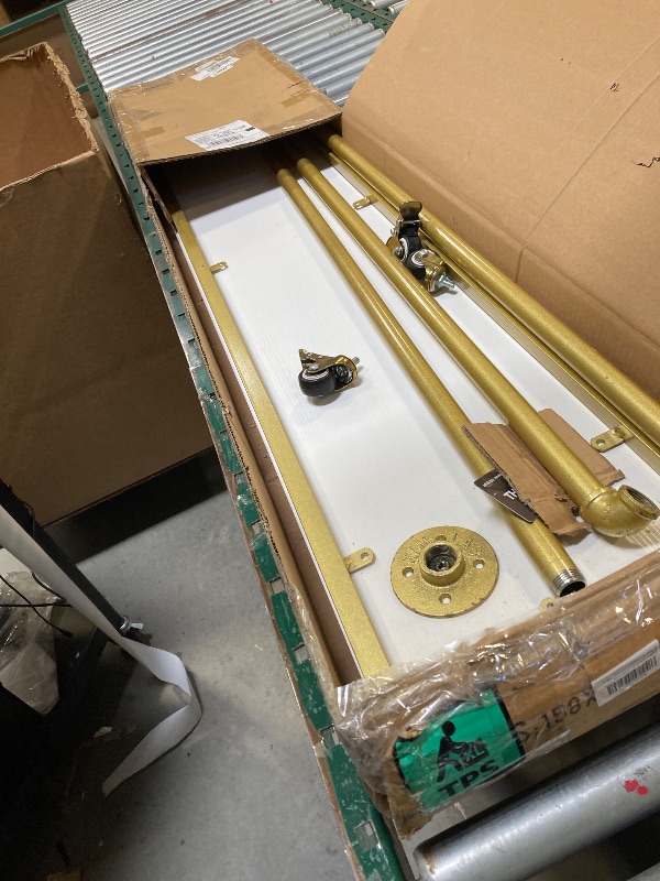 Photo 1 of Gold Metal Clothes Rack