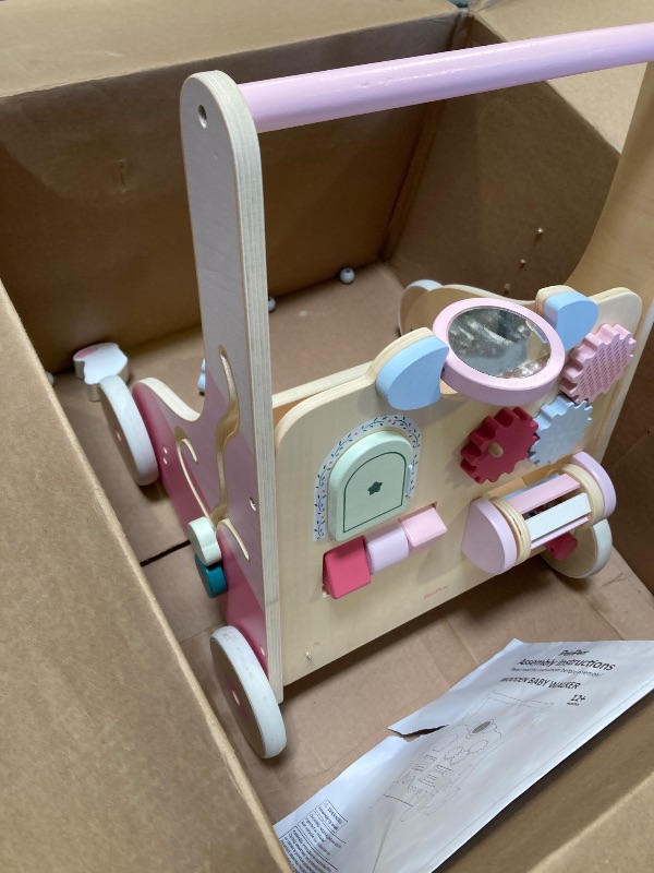 Photo 1 of Wooden baby walker 