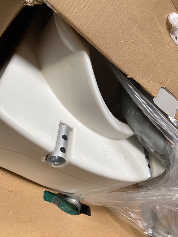 Photo 1 of Medline 5" Elongated Raised Toilet Seat, with Lock and Removable Padded Arms- A Medical Seat for Seniors, Elderly, Adults, or Post-Surgery Recovery, 1 Ct.