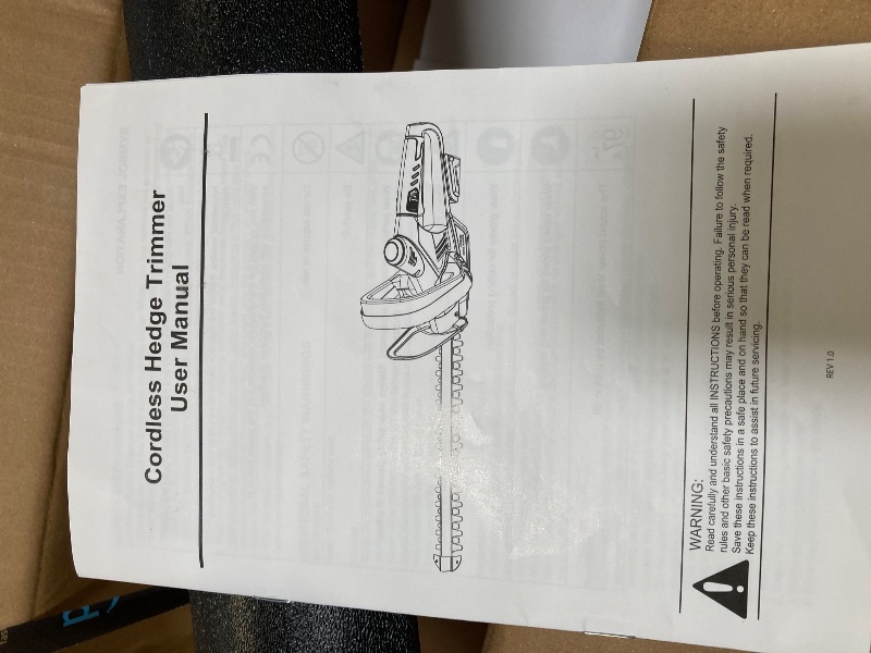 Photo 1 of cordless hedge trimmer 