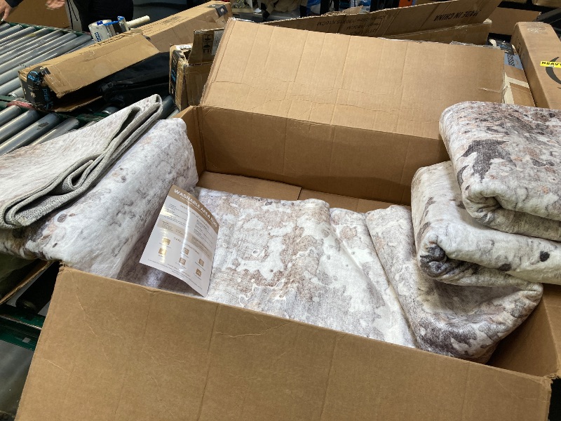 Photo 1 of oversized large area rug. 9ft by 12ft white brown grey